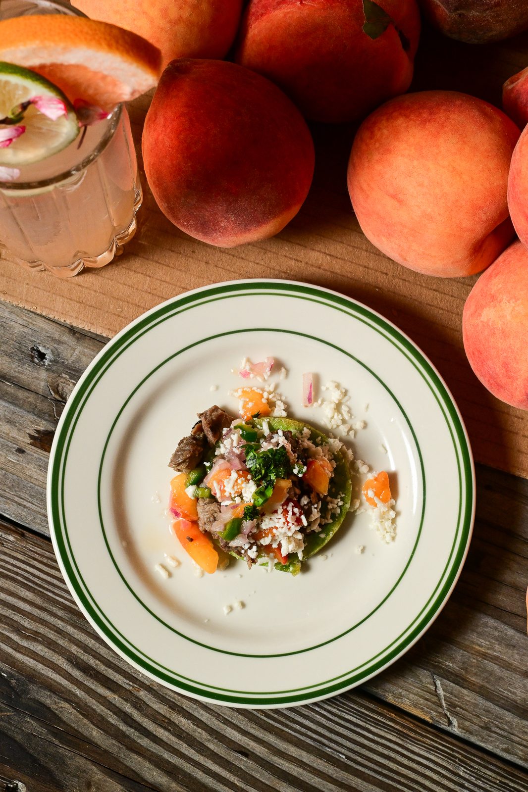 Peach salad with greens and crumbled cheese — PeachFest 2026
