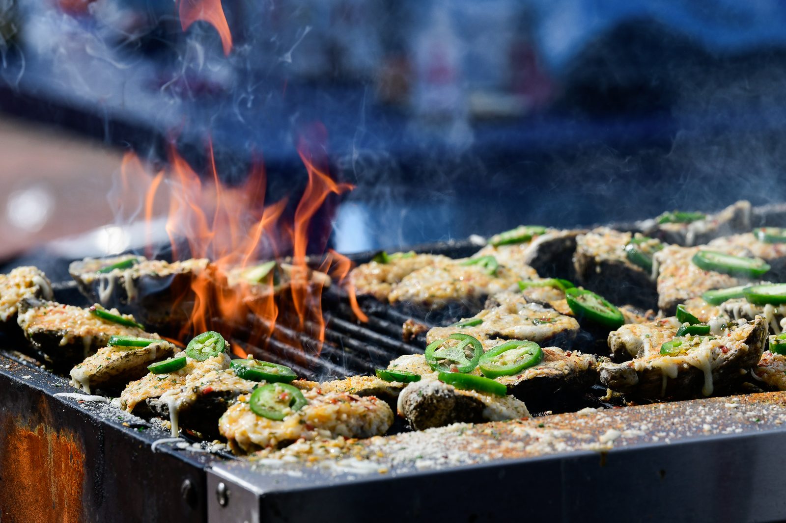 Live fire — dishes sizzling on the grill — PeachFest 2026
