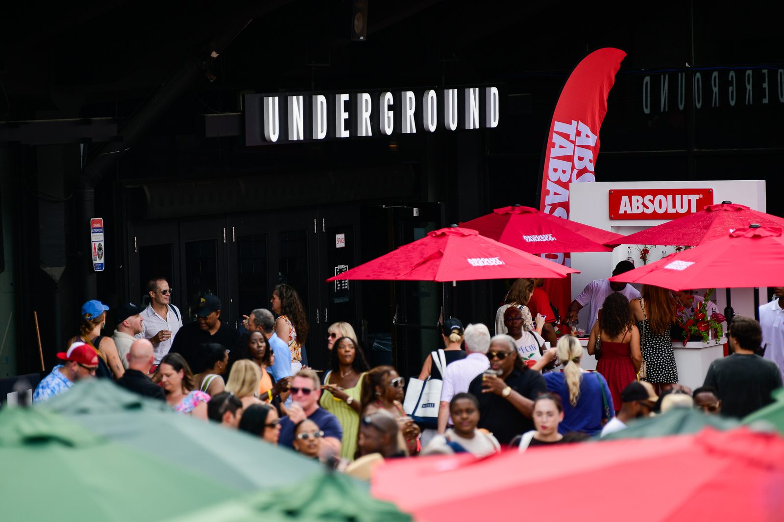 Underground Atlanta packed under the red umbrellas — PeachFest 2026