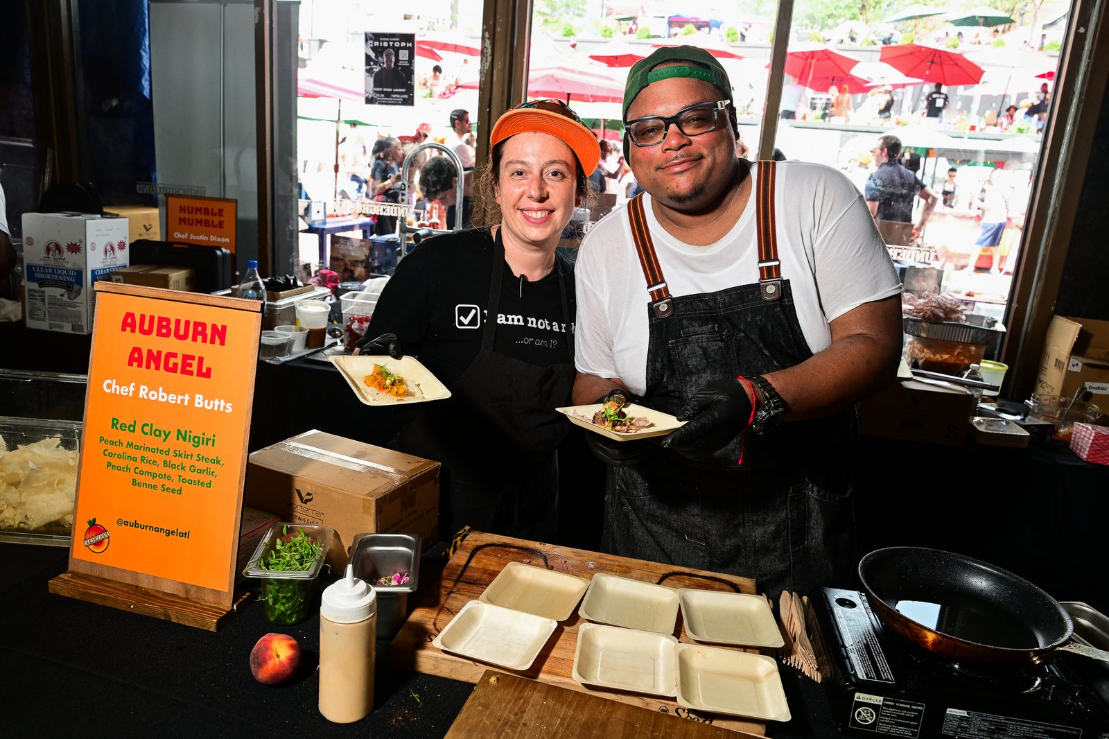 Chef Robert Butts and Chef Angel serving the Peach Omakase — PeachFest 2026